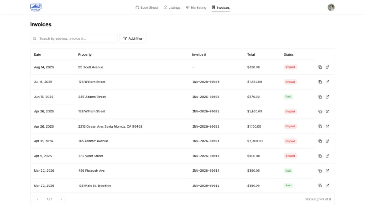 The client portal invoice list with paid and unpaid invoices